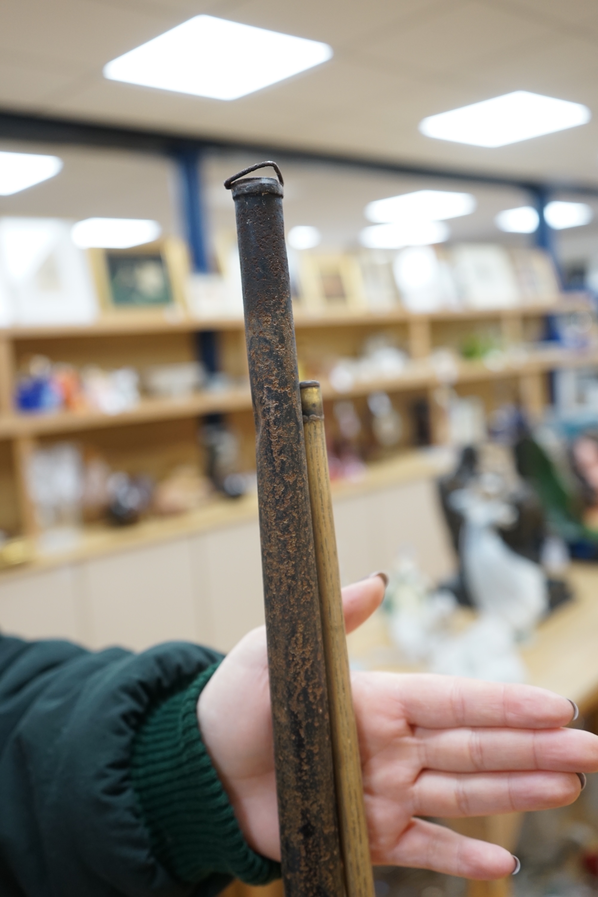 Knife Cleaner by CSSA Ltd 136-142 Queen Victoria Street, London, together with a Burroughes and Watts, London, snooker cue, in case, cue 147cm long (2). Condition - fair, tin snooker container rusty